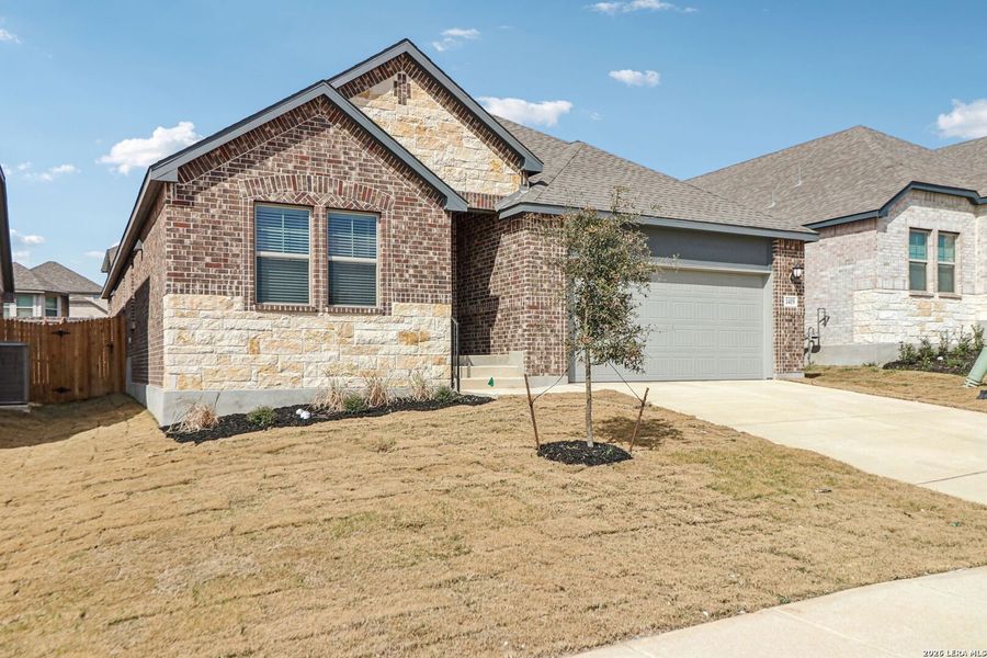 Front exterior of a new home in Arcadia Ridge - Classic Series, San Antonio, TX, highlighting curb appeal (Image 28).