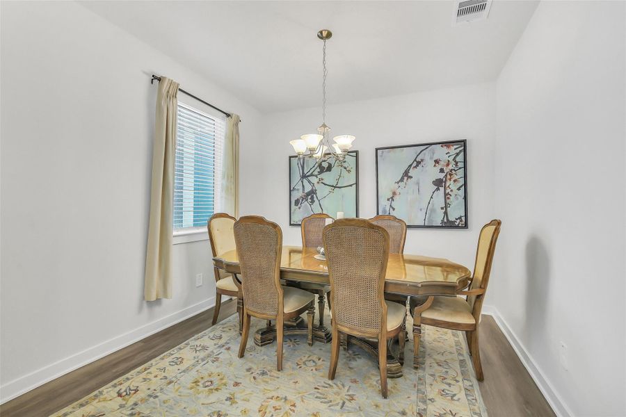 Dedicated dining space with plenty of room for hosting dinner parties, holiday gatherings, or enjoying everyday meals with family.