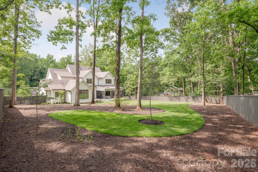 Lovely shade trees and flat backyard