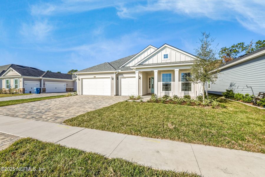 Front exterior of a new home in Silver Landing at SilverLeaf, St. Augustine, FL, highlighting curb appeal (Image 25).