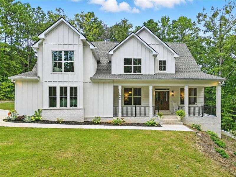 Front exterior of a new home in , Acworth, GA, highlighting curb appeal (Image 24).
