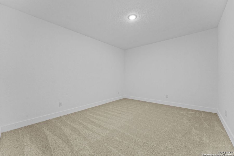 Spacious, unfurnished interior of a new home in Gatehouse: Classic Collection, New Braunfels (Image 28).