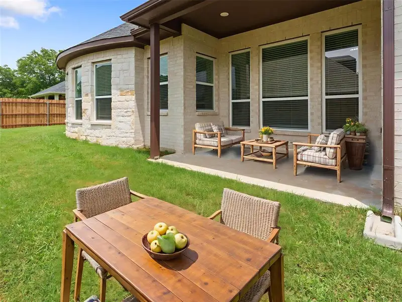 Exterior details and patio area of a home in , Denison (Image 4).