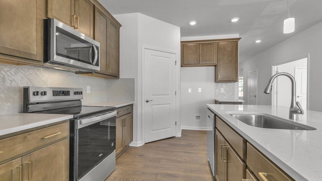 Furnished interior view inside a new home in Quarry Hills - Freedom, Graham (Image 6).
