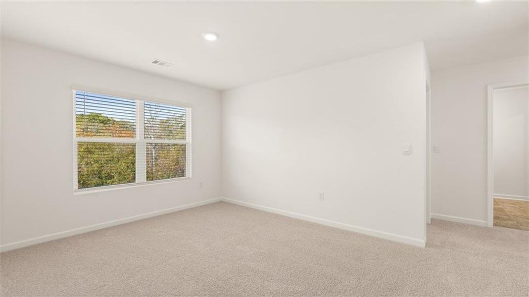 Spacious, unfurnished interior of a new home in Brooks Station, Dacula (Image 32).