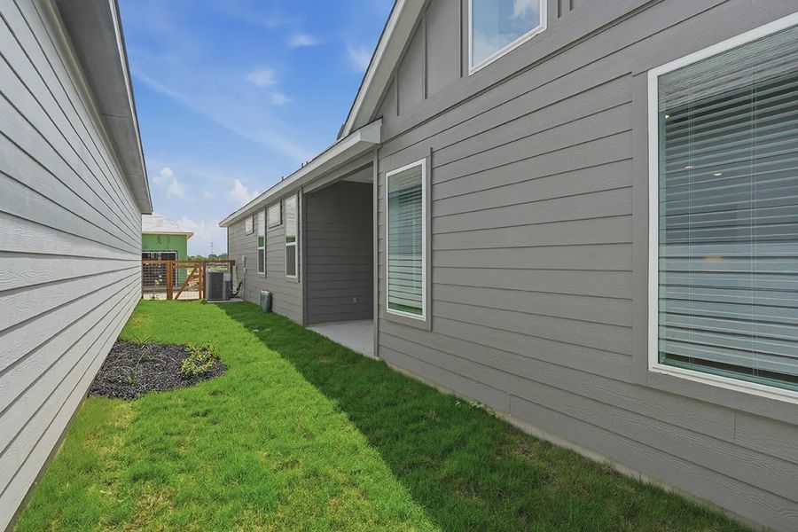 Exterior details and patio area of a home in The Crossvine, Schertz (Image 29).