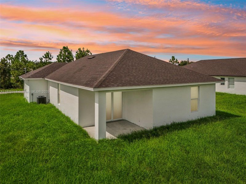 Exterior details and patio area of a home in , Lehigh Acres (Image 19). Exterior details and patio area of a home in , Lehigh Acres (Image 19).