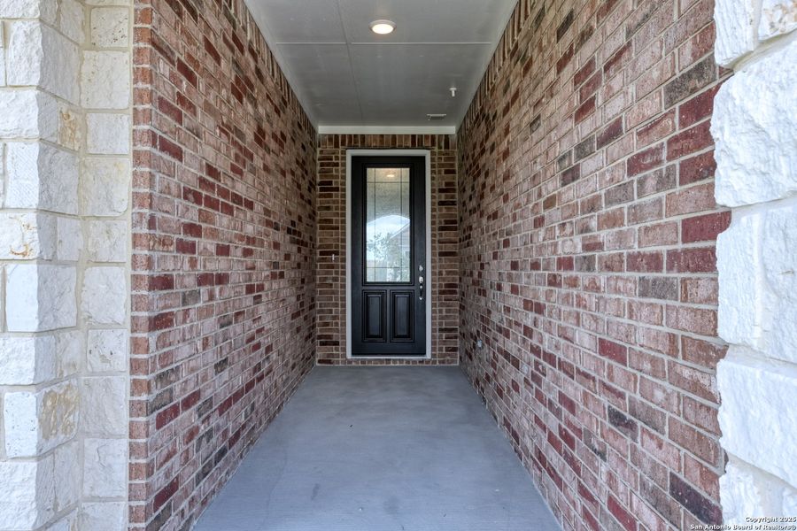 Exterior details and patio area of a home in Cordova Trails, Seguin (Image 16).