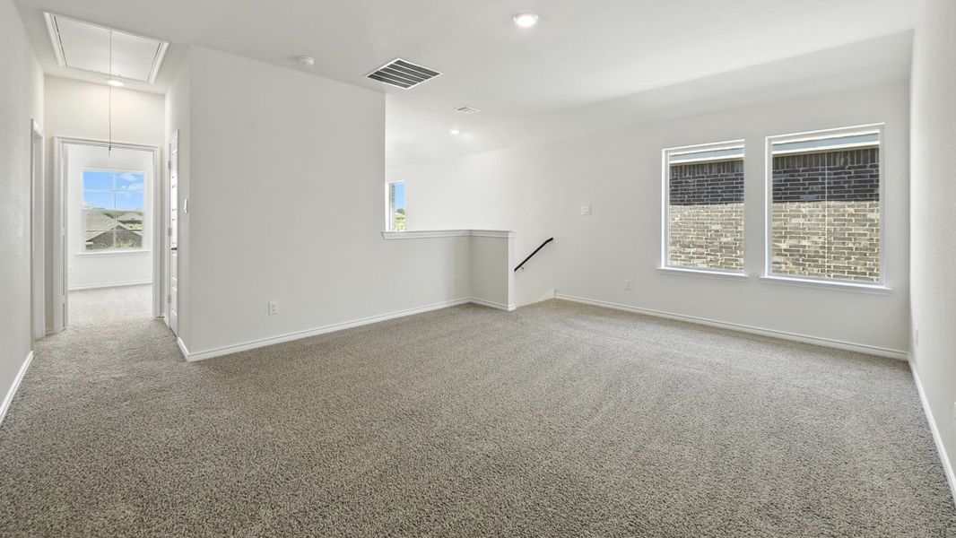 Representative unfurnished interior of a home built from the 3217 Amethyst by D.R. Horton in Silverado, Aubrey (Image 13).