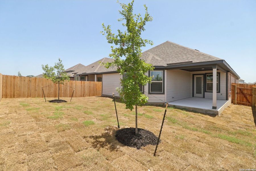 Exterior details and patio area of a home in Kallison Ranch, San Antonio (Image 27).