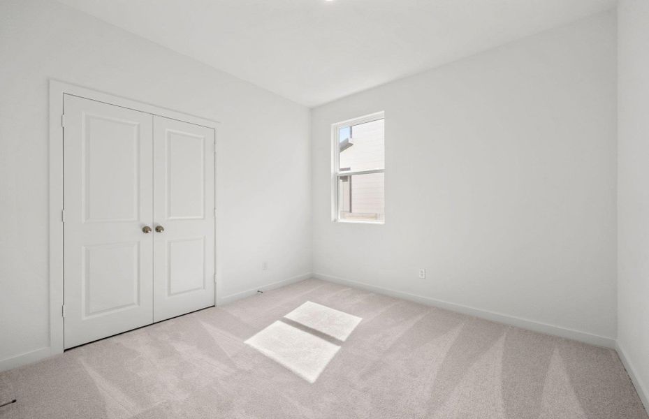 Spacious, unfurnished interior of a new home in Sunfield, Buda (Image 10). Spacious, unfurnished interior of a new home in Sunfield, Buda (Image 10).