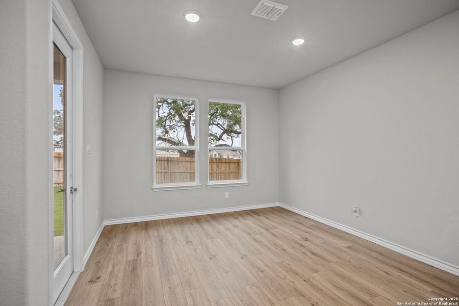 Spacious, unfurnished interior of a new home in The Reserve at Potranco Oaks, Castroville (Image 52).