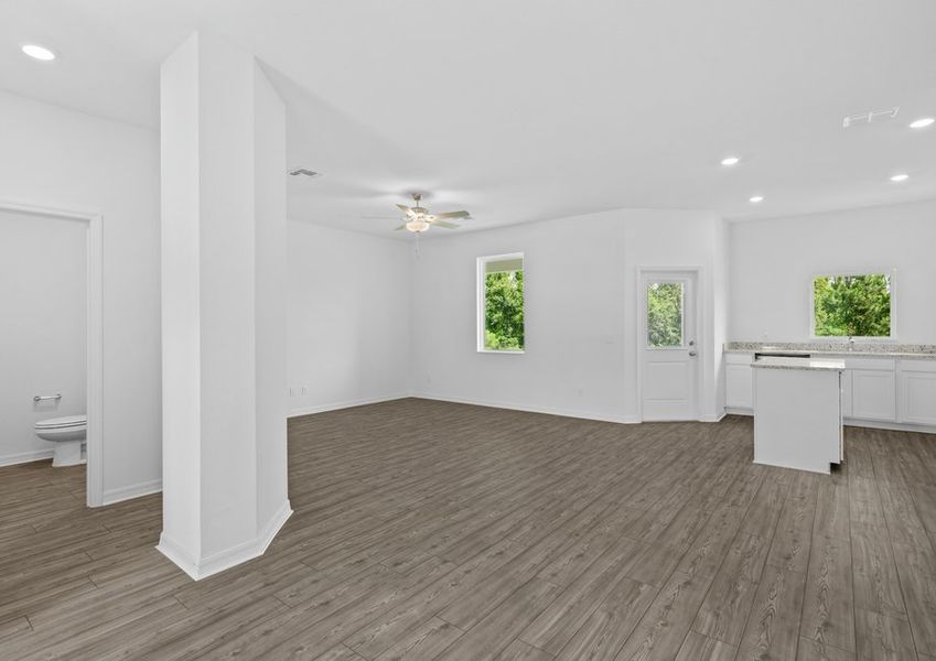 A pwder bathroom is situated off of the living room for guest to use when visiting! A pwder bathroom is situated off of the living room for guest to use when visiting!