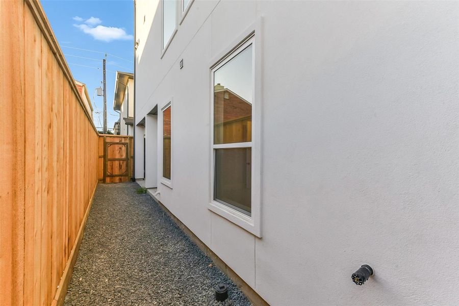 Exterior details and patio area of a home in , Houston (Image 27).