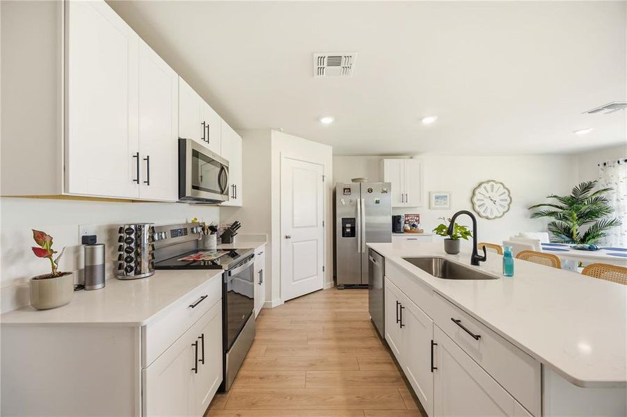 Furnished interior view inside a new home in Central Parc, North Port (Image 43).