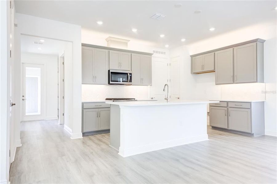 Furnished interior view inside a new home in Bungalow Walk at Lakewood Ranch, Sarasota (Image 8).