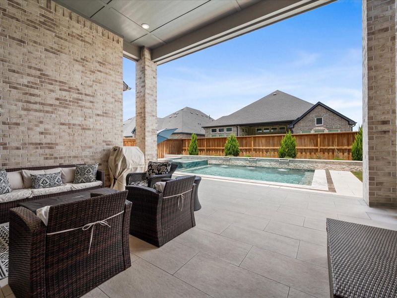 Exterior details and patio area of a home in , Spring (Image 3).