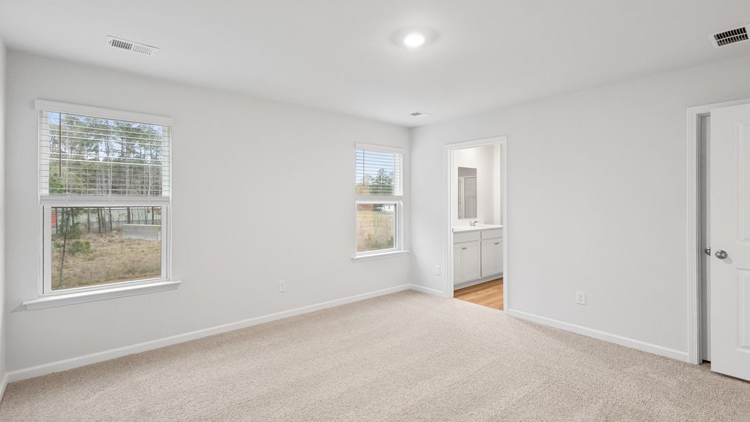 Spacious, unfurnished interior of a new home in Pine Hills at Cane Bay, Summerville (Image 16).