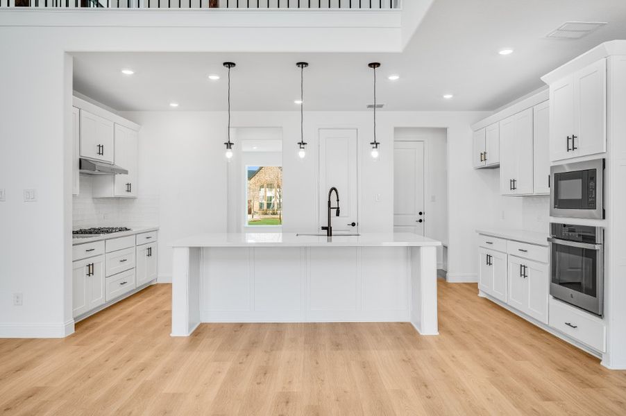 Representative furnished interior of a home built from the Sapphire by Taylor Morrison in Highland Lakes 60s, McKinney (Image 3).