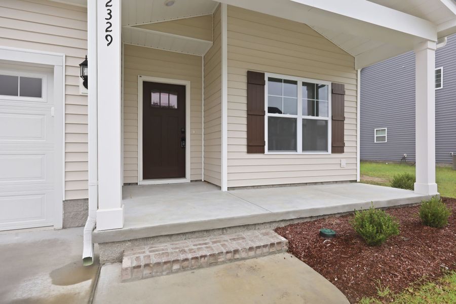 Exterior details and patio area of a home in Davenport Farms, Winterville (Image 27). Exterior details and patio area of a home in Davenport Farms, Winterville (Image 27).