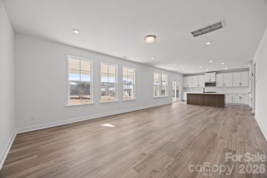 Family Room Looking Into The KitchenPhotos are representative and may not reflect the exact home, finishes, or features. Family Room Looking Into The KitchenPhotos are representative and may not reflect the exact home, finishes, or features.