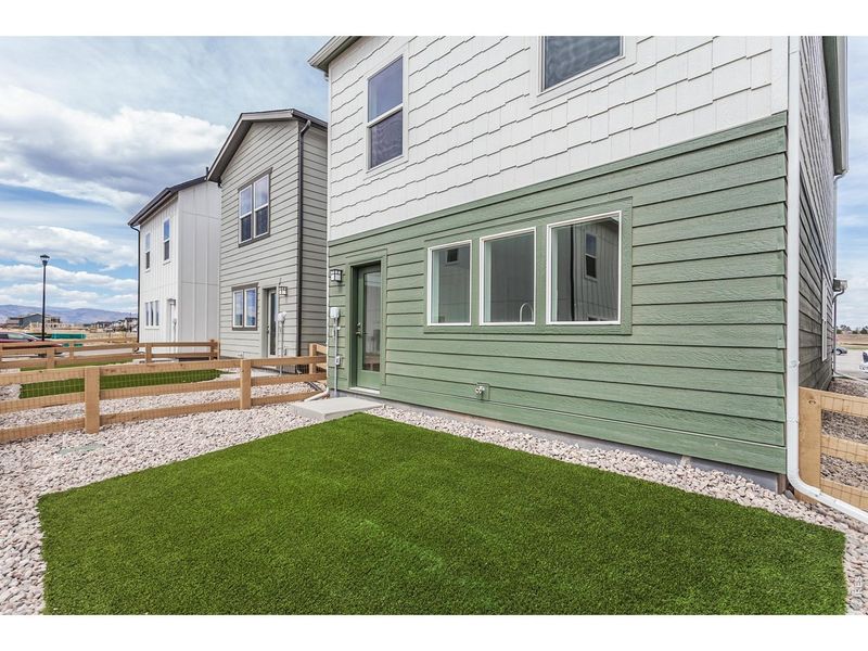 Exterior details and patio area of a home in Bloom Trailblazer Collection - Single Family Homes, Fort Collins (Image 27). Exterior details and patio area of a home in Bloom Trailblazer Collection - Single Family Homes, Fort Collins (Image 27).