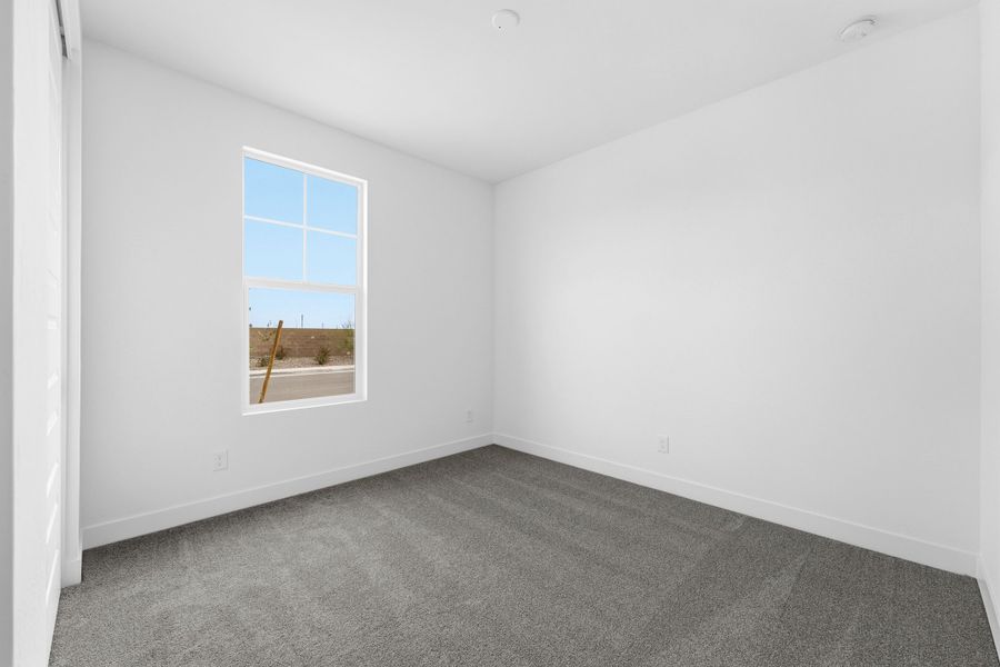 Spacious, unfurnished interior of a new home in Combs Ranch, San Tan Valley (Image 28).
