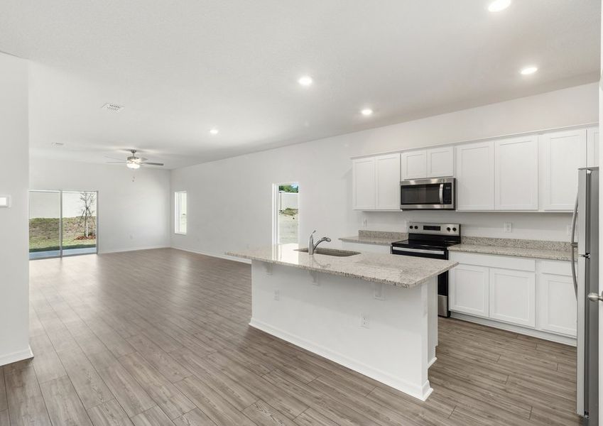 The kitchen looks over the family room The kitchen looks over the family room