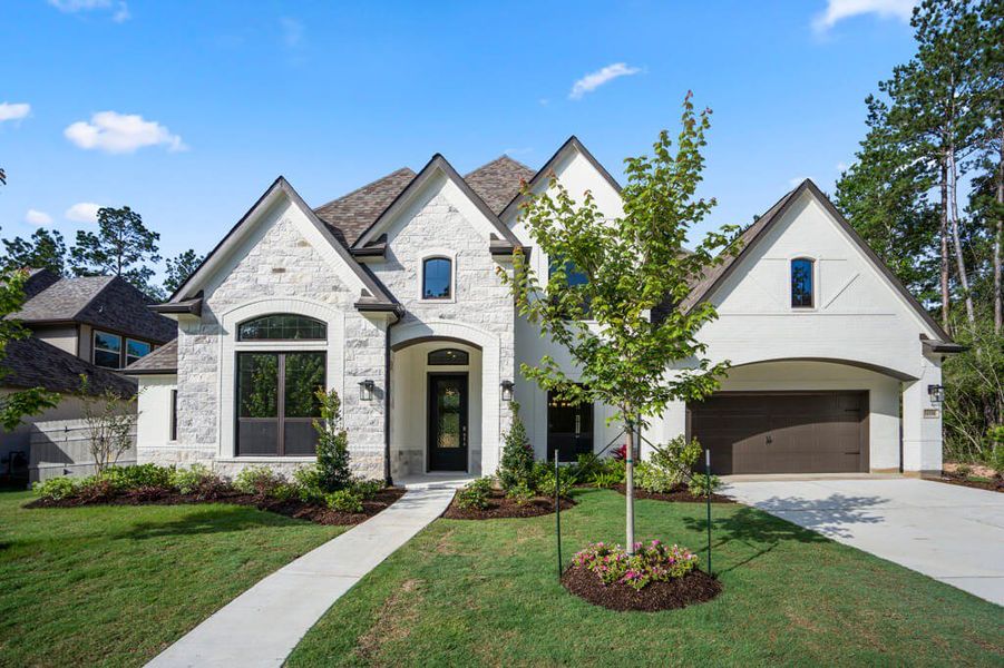 Representative exterior photo of a completed home built from the Reagan 3903 by J. Patrick Homes in Colton, Montgomery, TX (Image 2). Representative exterior photo of a completed home built from the Reagan 3903 by J. Patrick Homes in Colton, Montgomery, TX (Image 2).