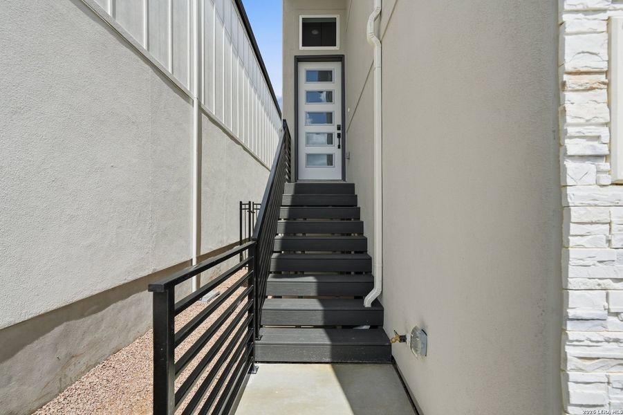 Exterior details and patio area of a home in Centero at Stone Oak, San Antonio (Image 3). Exterior details and patio area of a home in Centero at Stone Oak, San Antonio (Image 3).