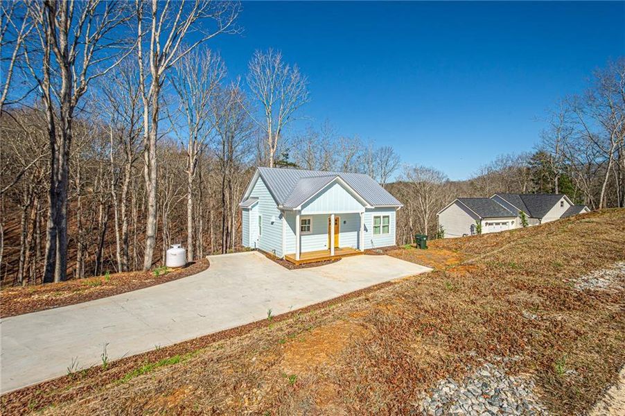 Exterior details and patio area of a home in , Dahlonega (Image 31).