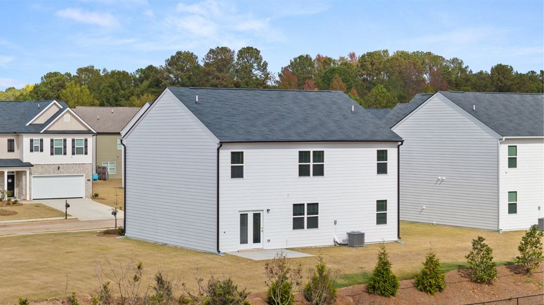 Front exterior of a new home in Locust Grove Station - Cedar Ridge, Locust Grove, GA, highlighting curb appeal (Image 22).