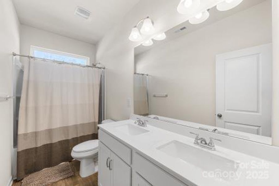 Furnished interior view inside a new home in Wilora Pond, Charlotte (Image 8). Furnished interior view inside a new home in Wilora Pond, Charlotte (Image 8).