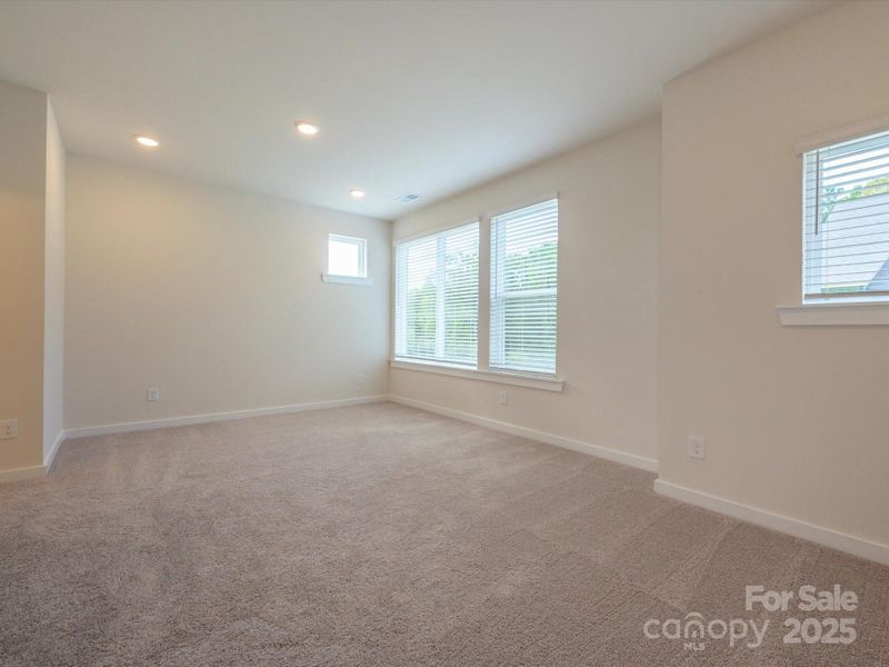 Spacious, unfurnished interior of a new home in Central Living at Craig, Charlotte (Image 18).