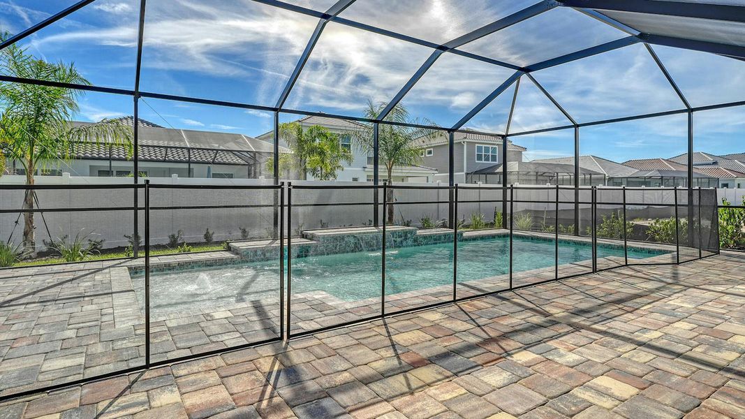 Exterior details and patio area of a home in Windward Real Estate and Homes for Sale in Sarasota, FL - Neal Communities, Lakewood Ranch (Image 28).