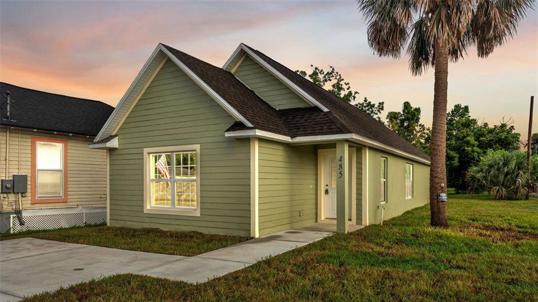Front exterior of a new home in , Bartow, FL, highlighting curb appeal (Image 16). Front exterior of a new home in , Bartow, FL, highlighting curb appeal (Image 16).