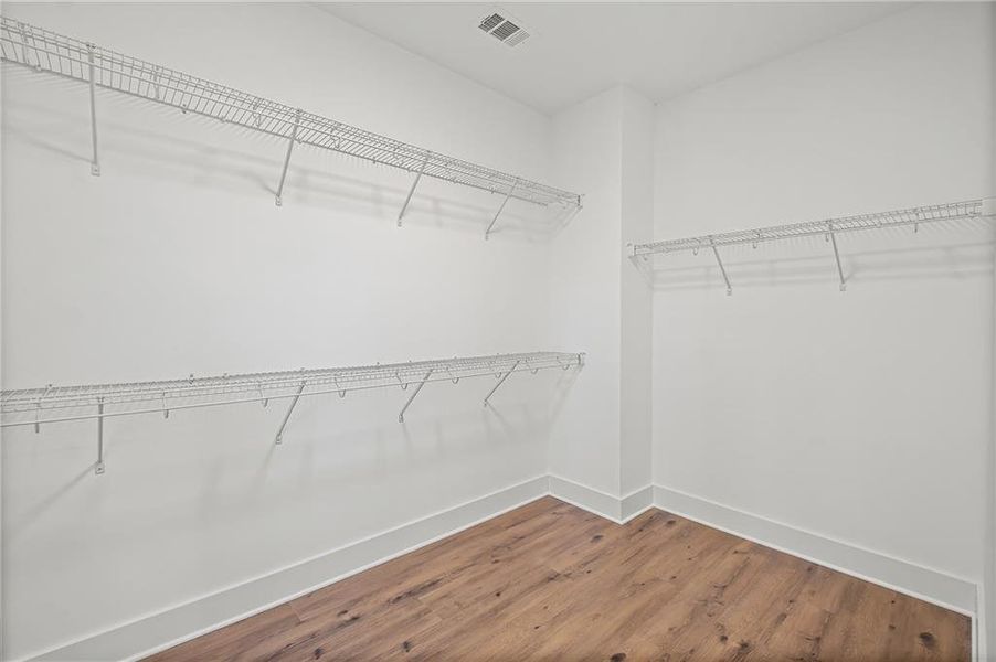 Spacious, unfurnished interior of a new home in Devin's Shire - A Kennesaw Tradition, Kennesaw (Image 35).