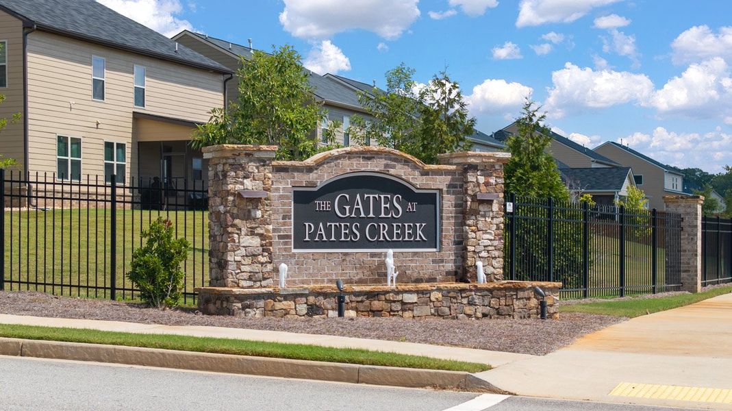 Front exterior of a new home in The Gates at Pates Creek, Hampton, GA, highlighting curb appeal (Image 27).