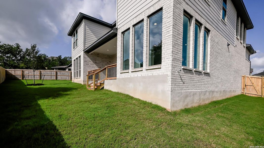 Exterior details and patio area of a home in Johnson Ranch, Bulverde (Image 3).