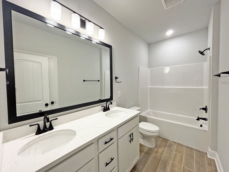 Furnished interior view inside a new home in Natureview, Freeport (Image 13).