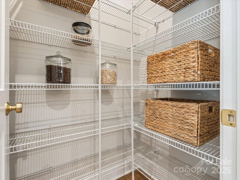 Large pantry, not pictured: upgraded hardwood shelving. *Model Photos | Actual finishes, structural selections, and orientation may vary.