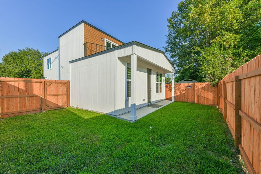 Exterior details and patio area of a home in , Baytown (Image 2).