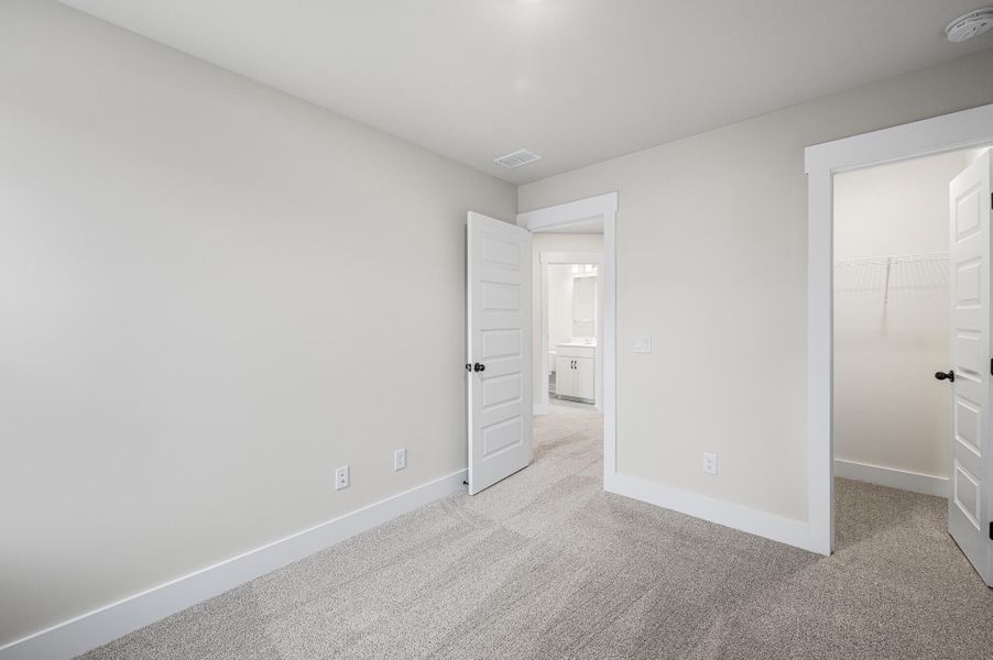 Photo is of a similar home