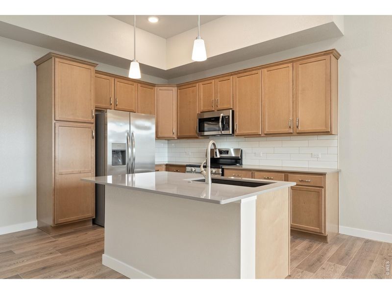 Furnished interior view inside a new home in The Lakes at Centerra, Loveland (Image 14).
