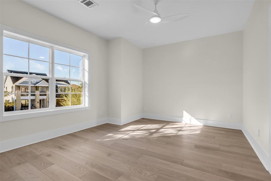 Secondary bedrooms are filled with natural light