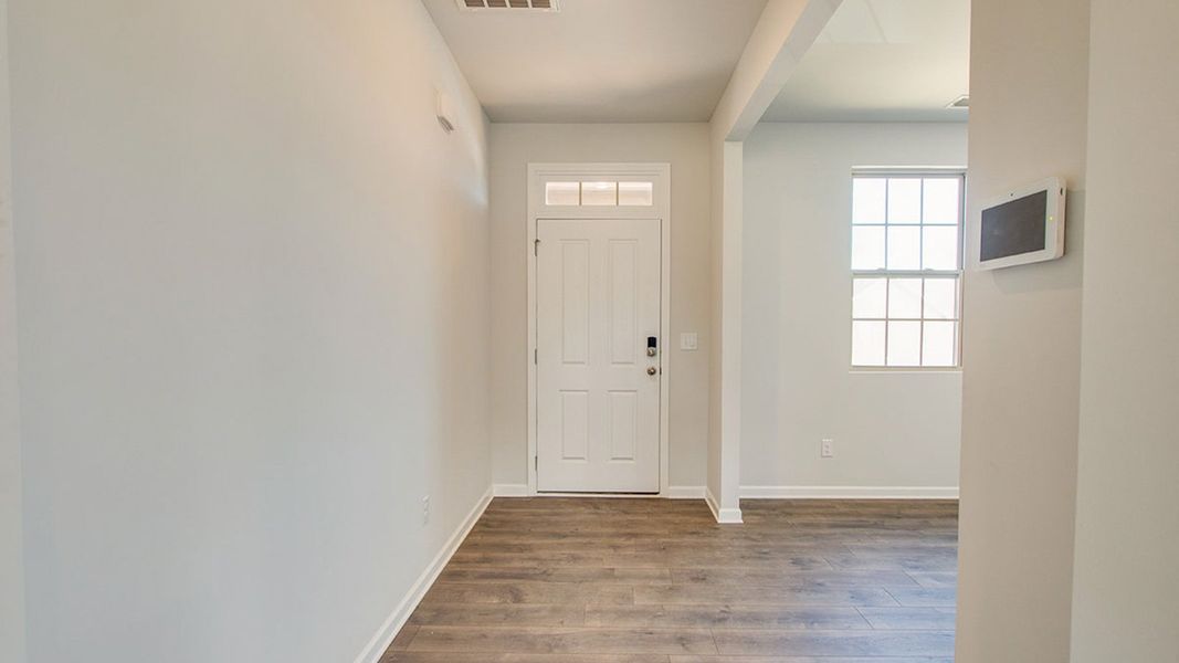 Spacious, unfurnished interior of a new home in The Parks, White House (Image 15).