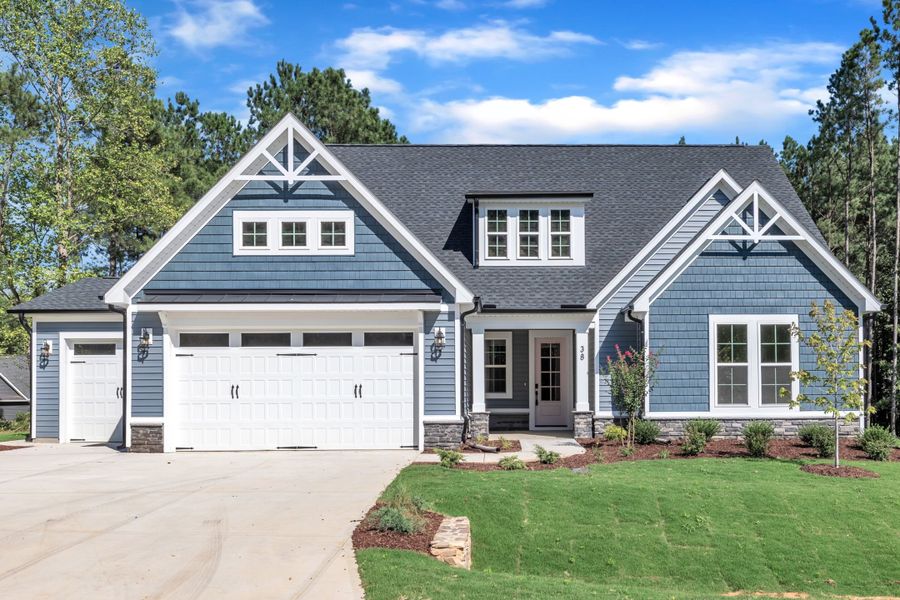 Representative exterior photo of a completed home built from the The Bradley by RobuckHomes in Baylee Ridge, Selma, NC (Image 41). Representative exterior photo of a completed home built from the The Bradley by RobuckHomes in Baylee Ridge, Selma, NC (Image 41).