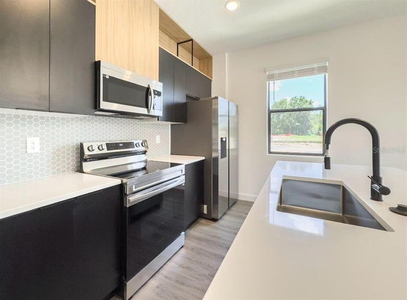 Furnished interior view inside a new home in , Kissimmee (Image 10).