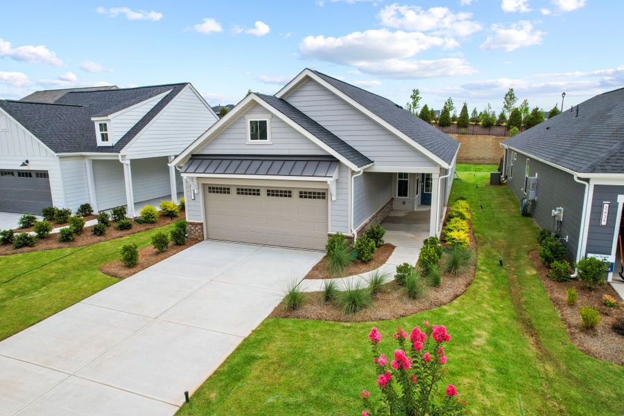 Front exterior of a new home in Carolina Riverside, Belmont, NC, highlighting curb appeal (Image 40). Front exterior of a new home in Carolina Riverside, Belmont, NC, highlighting curb appeal (Image 40).