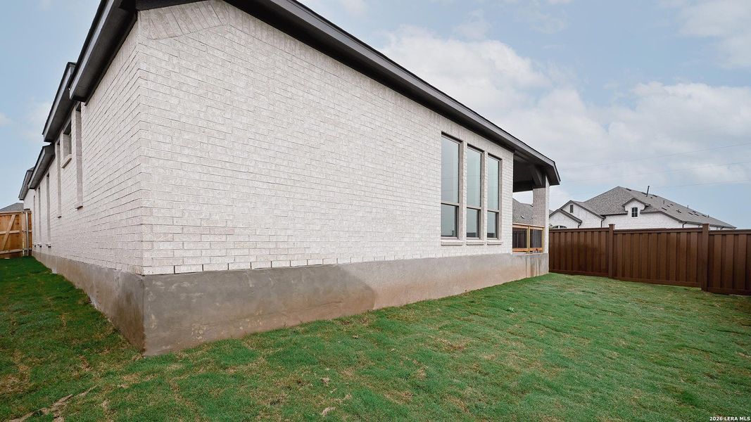 Exterior details and patio area of a home in Mayfair, New Braunfels (Image 24).
